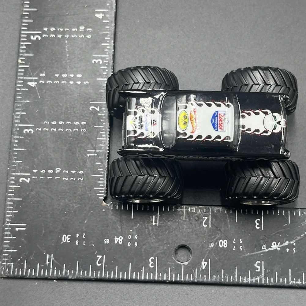 1957 Chevy 1:64‎ Avenger Hot Wheels Monster Truck Black W/White Flames